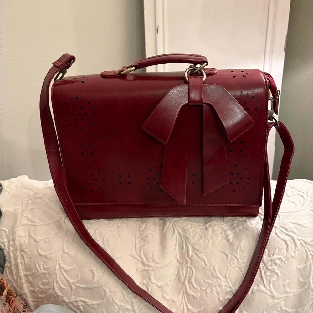 Elegant Red Handbag with Bow Accent